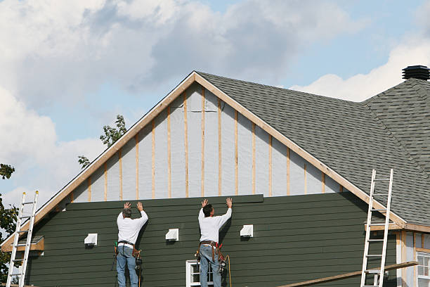 Professional Emergency Siding Repair technician working in Peyton, CO